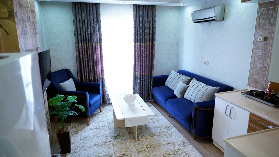 Daire 9 — salon, mutfak köşesi ve klima