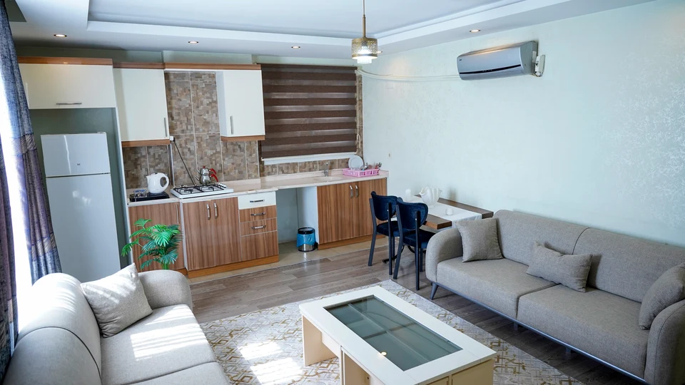 Daire 17 — oturma alanı ve yemek köşesi